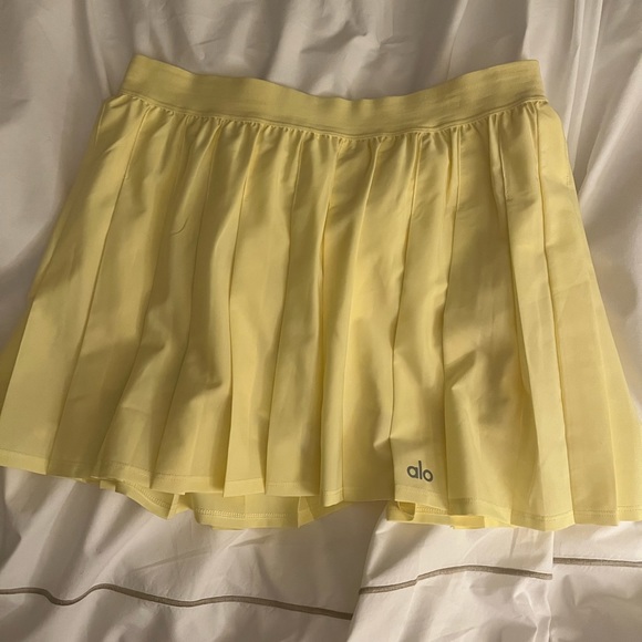 ALO Yoga Dresses & Skirts - ALO Yoga varsity pleated tennis mini skirt/skort in yellow